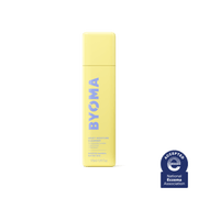 Une bouteille jaune de Byoma Milky Moisture Cleanser avec le sceau de la National Eczema Association. 