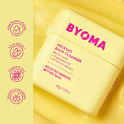 Baume nettoyant fondant BYOMA sur fond jaune avec icônes de la marque.